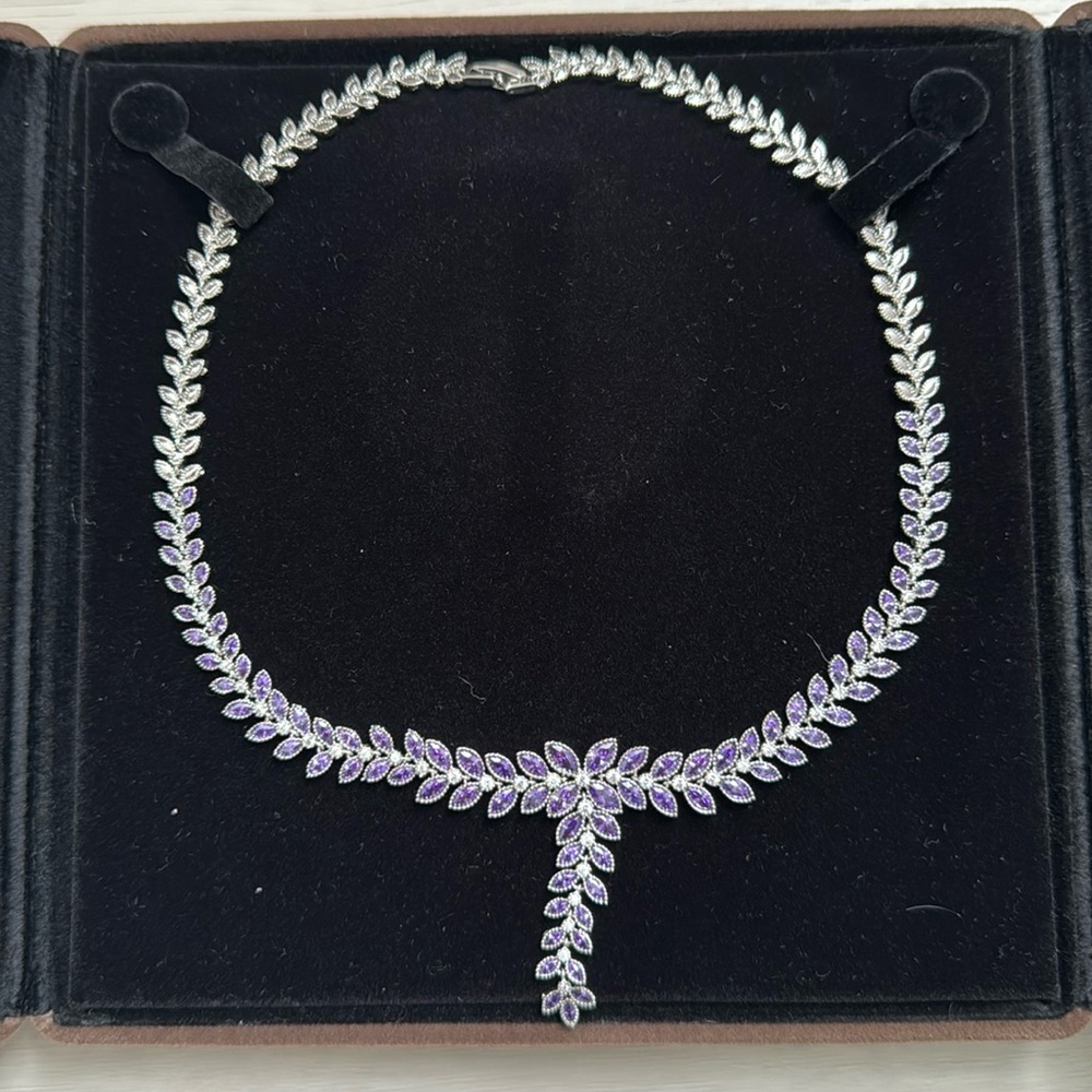Leaf cluster shape necklace with purple jewels